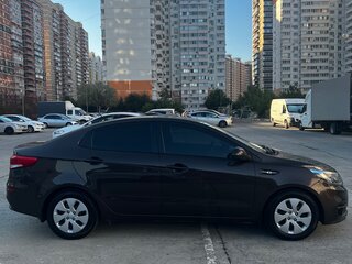 2015 Kia Rio 6-speed III, коричневый, 1230000 рублей, вид 2