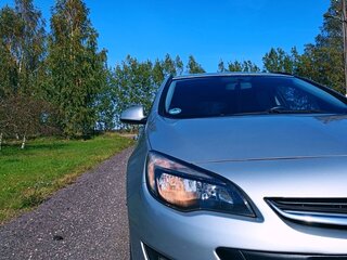 2015 Opel Astra J Рестайлинг, серебристый, 1011083 рублей, вид 3
