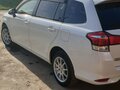 2016 Toyota Corolla Fielder XI (E160, E170, E180) Рестайлинг 1, белый, 1199000 рублей - вид 8