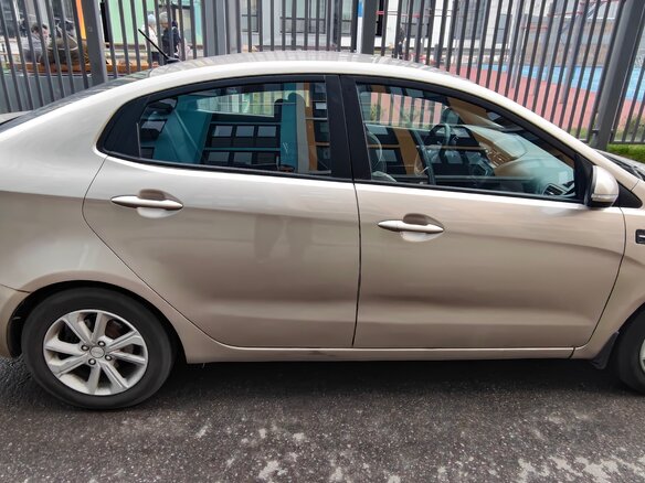 2014 Kia Rio 4-speed III, бежевый - вид 7