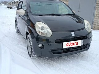 2010 Toyota Passo II (C30), чёрный, 595000 рублей, вид 2