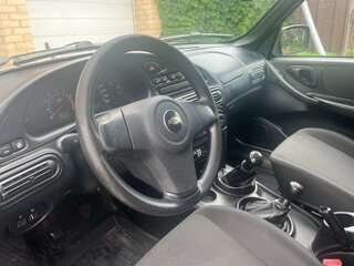 2016 Chevrolet Niva I Рестайлинг, серый, 590000 рублей, вид 4