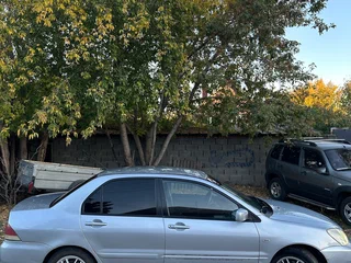 2005 Mitsubishi Lancer IX Рестайлинг, серебристый, 215000 рублей, вид 2