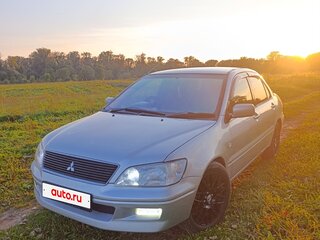 2002 Mitsubishi Lancer Cedia IX, серебристый, 255000 рублей, вид 1