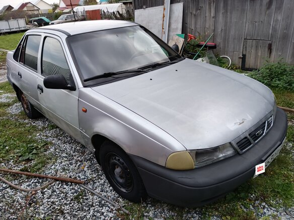 2002 Daewoo Nexia I, серый - вид 1