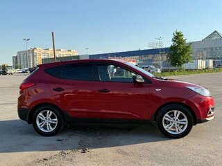2010 Hyundai ix35 I, красный, 835000 рублей, вид 4