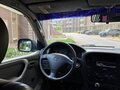 1998 Toyota Land Cruiser 105 100 Series, серебристый - вид 2