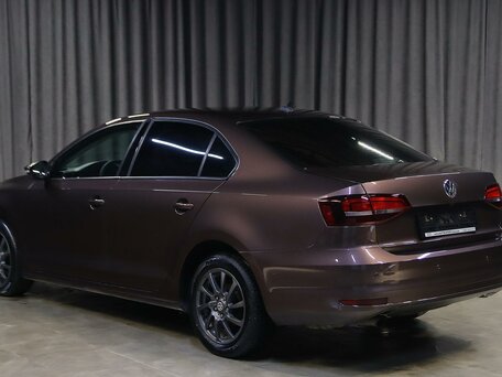 2016 Volkswagen Jetta VI Рестайлинг, коричневый, 1099000 рублей, вид 4