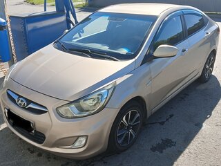 2011 Hyundai Solaris I, бежевый, 620000 рублей, вид 2
