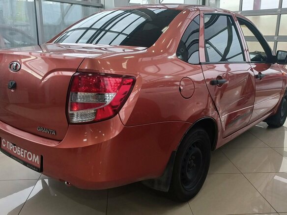 2014 Lada (ВАЗ) Granta I, оранжевый, 359000 рублей - вид 4