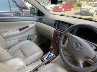 2004 Toyota Corolla IX (E120, E130) Рестайлинг, белый, 600000 рублей, вид 5