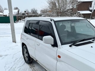 1999 Mitsubishi Pajero iO, белый, 310000 рублей, вид 5