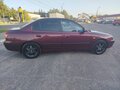 2010 Hyundai Elantra ТагАЗ III (XD2) Рестайлинг, красный - вид 5
