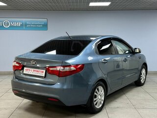 2013 Kia Rio 5-speed III, голубой, 550000 рублей, вид 5