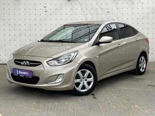 2011 Hyundai Solaris I, бежевый, 880000 рублей, вид 1