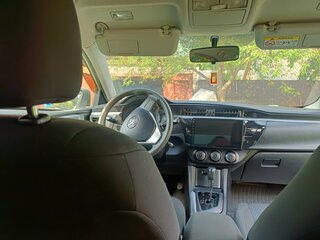 2013 Toyota Corolla XI (E160, E170, E180), серебристый, 1250000 рублей, вид 3