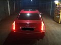 2009 Cadillac CTS II, пурпурный - вид 3