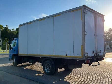 2010 Isuzu Elf (N-series), синий, 1850000 рублей, вид 2