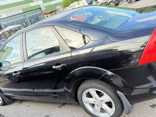 2010 Ford Focus II Рестайлинг, чёрный, 600000 рублей, вид 3