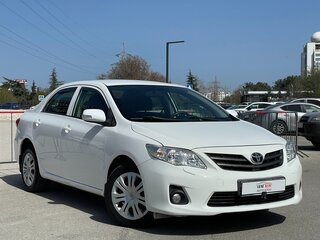 2010 Toyota Corolla X (E140, E150) Рестайлинг, белый, 1297000 рублей, вид 2