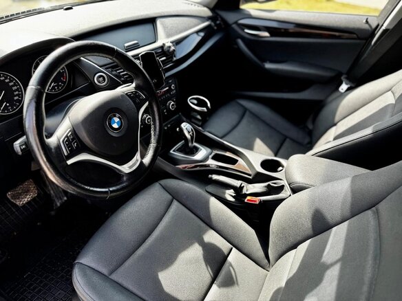 2012 BMW X1 20i I (E84) Рестайлинг, коричневый, 1350000 рублей - вид 5