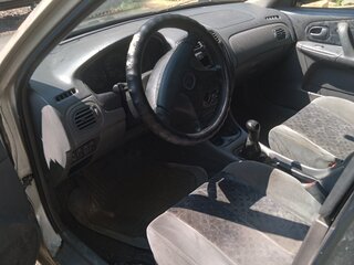 1999 Mazda 323 VI (BJ), золотистый, 95000 рублей, вид 5