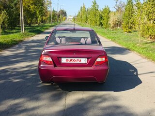 2011 Daewoo Nexia I Рестайлинг, пурпурный, 295000 рублей, вид 4