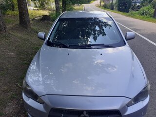 2009 Mitsubishi Lancer X, серебристый, 510000 рублей, вид 4