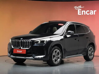 2024 BMW X1 18d sDrive III (U11/U12), чёрный, 5329000 рублей, вид 1