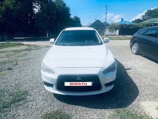2011 Mitsubishi Lancer X Рестайлинг, белый, 650000 рублей, вид 1