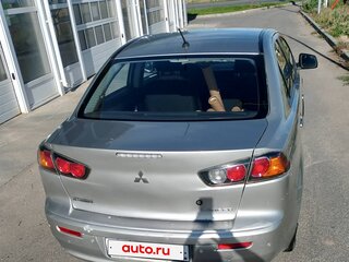 2014 Mitsubishi Lancer X Рестайлинг, серебристый, 870000 рублей, вид 4
