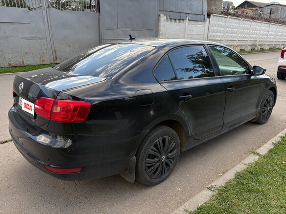 2012 Volkswagen Jetta VI, чёрный - вид 2