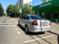 2011 Ford Focus II Рестайлинг, серебристый, 590000 рублей - вид 4