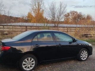2008 Toyota Corolla X (E140, E150), чёрный, 640000 рублей, вид 1