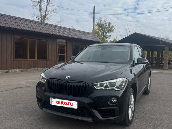 2018 BMW X1 18i sDrive II (F48), чёрный - вид 1