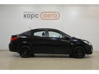 2012 Hyundai Solaris I, чёрный, 679000 рублей, вид 4