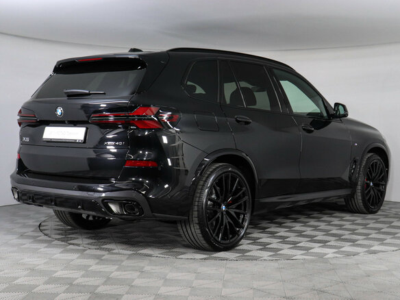 2024 BMW X5 40i IV (G05/G18) Рестайлинг, чёрный - вид 4