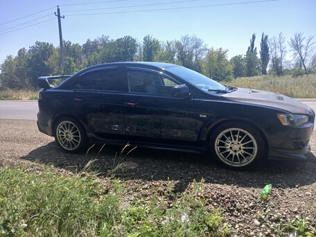 2010 Mitsubishi Lancer X, чёрный, 860000 рублей, вид 4