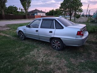 2012 Daewoo Nexia I Рестайлинг, серебристый, 220000 рублей, вид 4