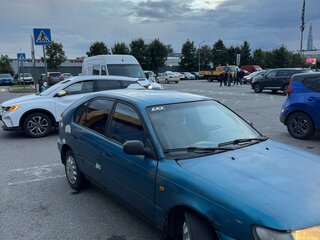 1997 Toyota Corolla VII (E100), синий, 65000 рублей, вид 2