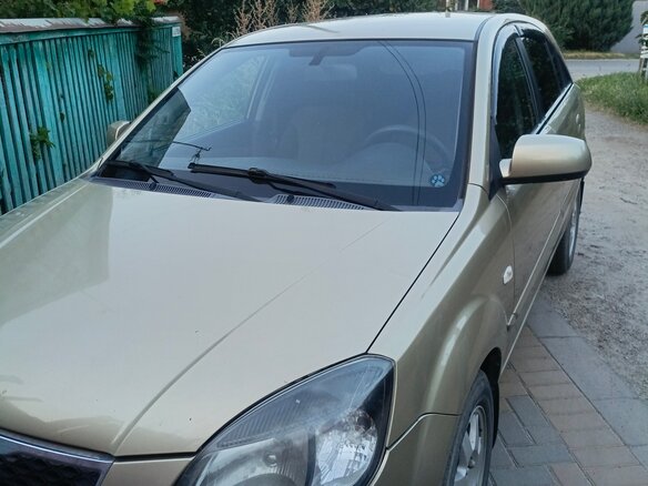 2011 Kia Rio II Рестайлинг, бежевый, 550000 рублей - вид 8