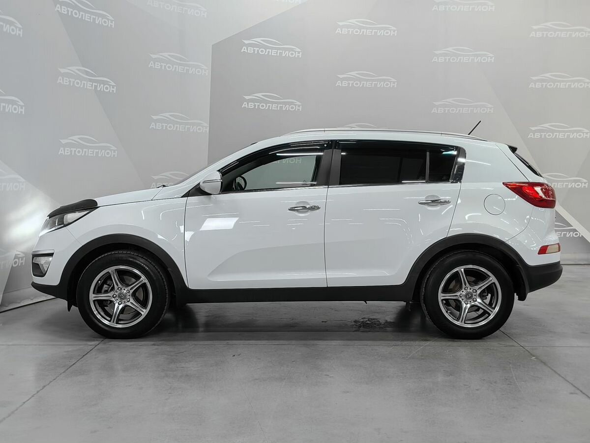 Открыть фотографии: Kia Sportage III