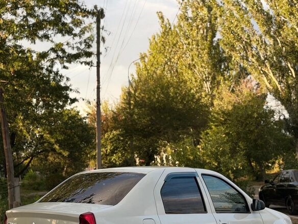 2012 Renault Logan I Рестайлинг, белый, 249000 рублей - вид 4