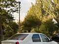 2012 Renault Logan I Рестайлинг, белый, 249000 рублей - вид 4