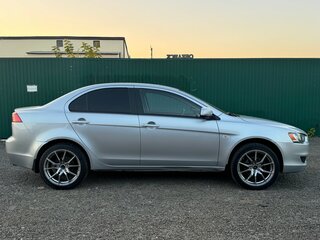 2009 Mitsubishi Lancer X, серебристый, 695000 рублей, вид 3
