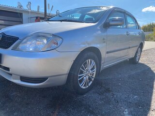 2003 Toyota Corolla IX (E120, E130), серый, 510000 рублей, вид 2