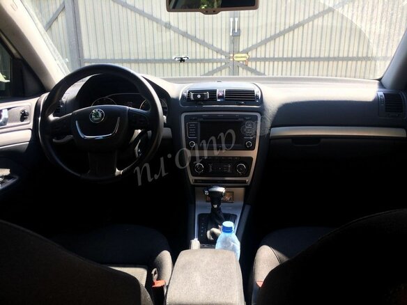 2011 Skoda Octavia II (A5) Рестайлинг, белый - вид 4