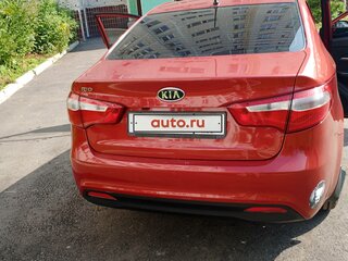 2012 Kia Rio 5-speed III, пурпурный, 630000 рублей, вид 5
