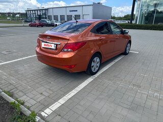 2015 Hyundai Solaris I Рестайлинг, оранжевый, 715000 рублей, вид 3