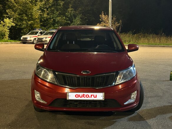 2012 Kia Rio 4-speed III, красный, 750000 рублей - вид 1